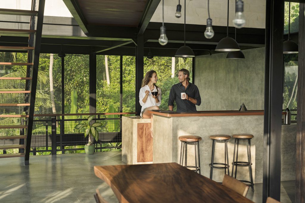 Man and woman chatting in their home